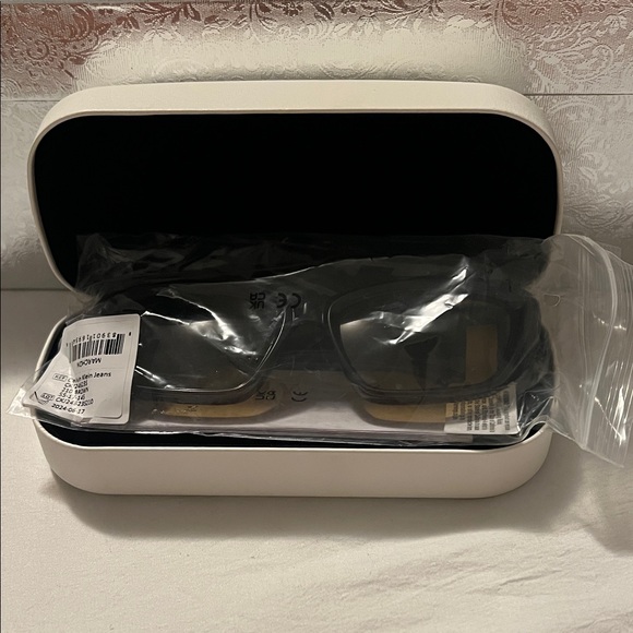 Calvin Klein Cat-Eye Sunglasses in Brown - Picture 6 of 6